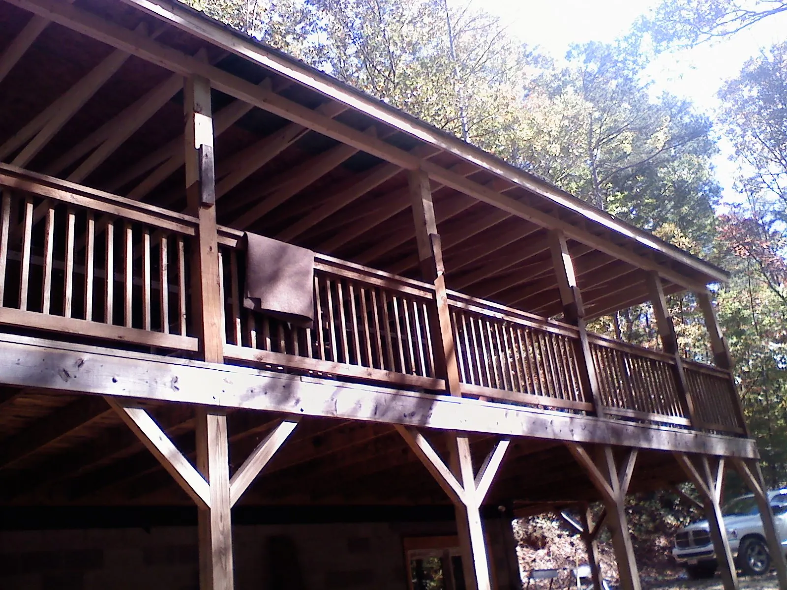 Timber framing under a new elevated porch and deck — Roof Leak Repair in New Bavaria by Roofing Brothers
